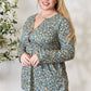 Heimish Full Size Floral Half Button Long Sleeve Blouse