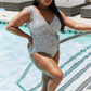 Marina West Swim Full Size Float On Ruffle Faux Wrap One-Piece in Black